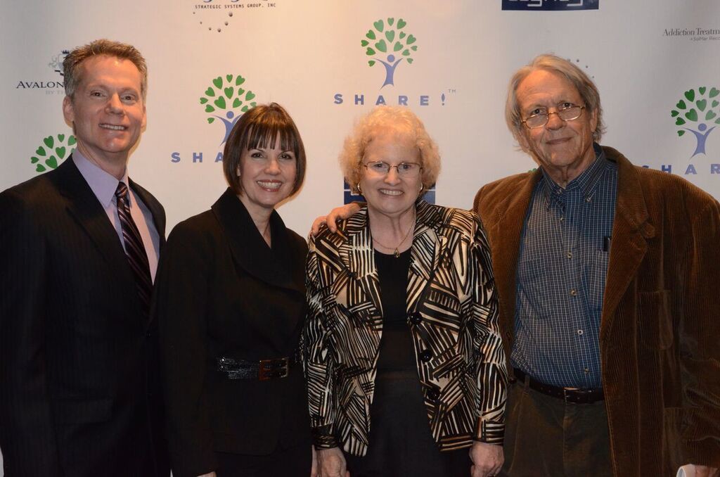 Honoree Valerie Garrett of Recovery International, with her husband, Ruth Hollman and Randy Wallburger